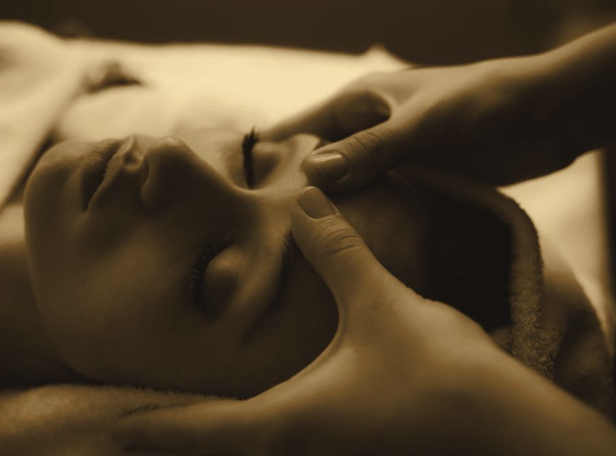 Head massage during a wellness spa therapy in Hyderabad